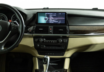 Подержанный автомобиль BMW X6 2013 года (14 фото)