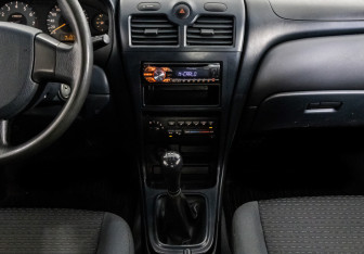 Подержанный автомобиль Nissan Almera Classic 2006 года (11 фото)