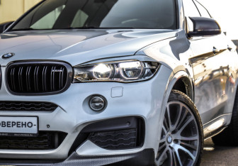 Подержанный автомобиль BMW X6 2019 года (2 фото)