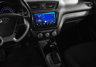 Подержанный автомобиль Kia Rio Sedan 2015 года (18 фото)