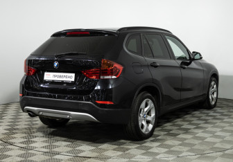 Подержанный автомобиль BMW X1 2014 года (5 фото)