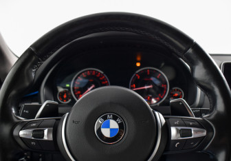 Подержанный автомобиль BMW X5 2015 года (15 фото)