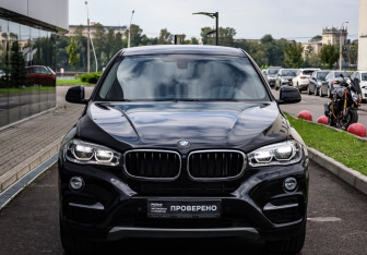Подержанный автомобиль BMW X6 2016 года (3 фото)