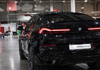 Подержанный автомобиль BMW X6 2023 года (10 фото)