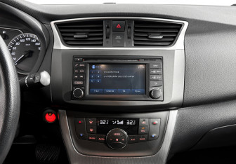 Подержанный автомобиль Nissan Tiida Hatchback 2015 года (16 фото)