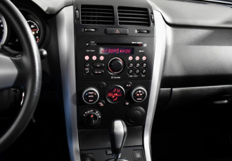 Подержанный автомобиль Suzuki Grand Vitara 2014 года (15 фото)