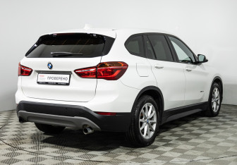Подержанный автомобиль BMW X1 2015 года (5 фото)
