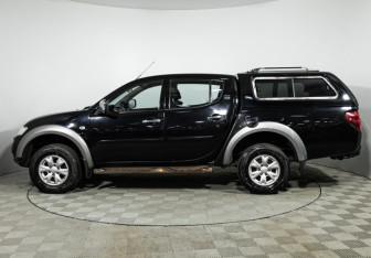 Подержанный автомобиль Mitsubishi L200 2014 года (8 фото)