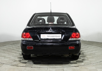 Подержанный автомобиль Mitsubishi Lancer Sedan 2009 года (6 фото)