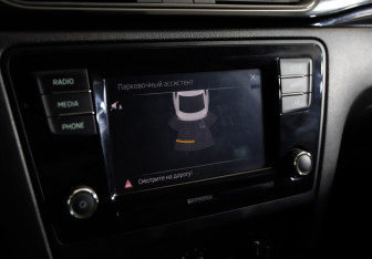 Подержанный автомобиль Skoda Rapid Liftback 2018 года (12 фото)