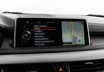 Подержанный автомобиль BMW X6 2015 года (22 фото)