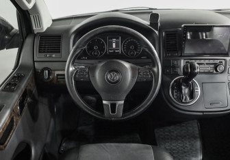 Подержанный автомобиль Volkswagen Multivan 2011 года (11 фото)