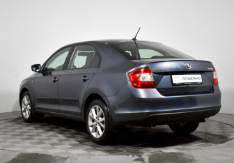 Подержанный автомобиль Skoda Rapid Liftback 2015 года (7 фото)