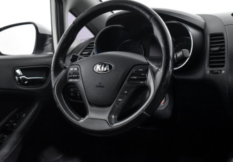 Подержанный автомобиль Kia Cerato Sedan 2013 года (14 фото)