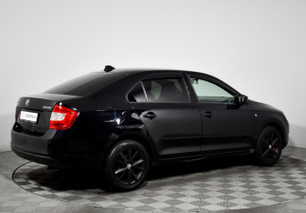 Подержанный автомобиль Skoda Rapid Liftback 2015 года (5 фото)