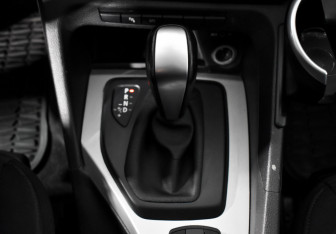 Подержанный автомобиль BMW X1 2010 года (10 фото)