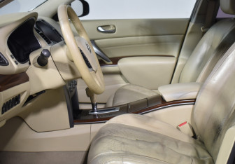 Подержанный автомобиль Nissan Teana 2011 года (10 фото)