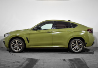 Подержанный автомобиль BMW X6 2014 года (8 фото)