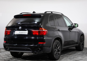 Подержанный автомобиль BMW X5 2010 года (5 фото)