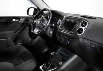 Подержанный автомобиль Volkswagen Tiguan 2016 года (14 фото)