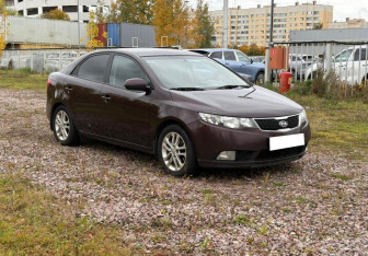Подержанный автомобиль Kia Cerato Sedan 2011 года (2 фото)