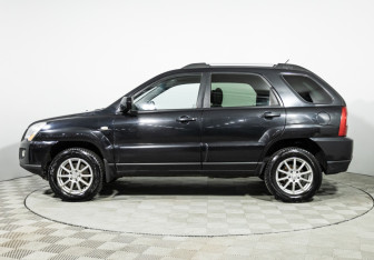 Подержанный автомобиль Kia Sportage 2010 года (8 фото)