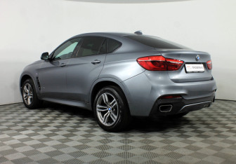 Подержанный автомобиль BMW X6 2019 года (21 фото)