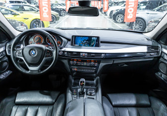 Подержанный автомобиль BMW X6 2016 года (17 фото)