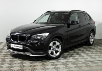 Подержанный автомобиль BMW X1 2014 года (2 фото)