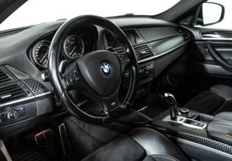 Подержанный автомобиль BMW X6 2014 года (11 фото)
