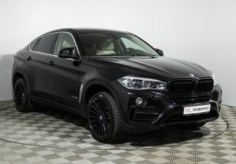 Подержанный автомобиль BMW X6 2015 года (3 фото)