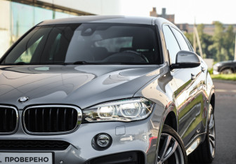 Подержанный автомобиль BMW X6 2017 года (2 фото)