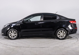 Подержанный автомобиль Kia Rio Sedan 2015 года (8 фото)