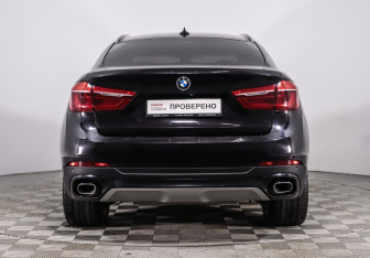Подержанный автомобиль BMW X6 2016 года (12 фото)