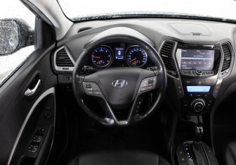Подержанный автомобиль Hyundai Santa Fe 2014 года (10 фото)