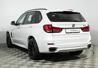 Подержанный автомобиль BMW X5 2015 года (7 фото)