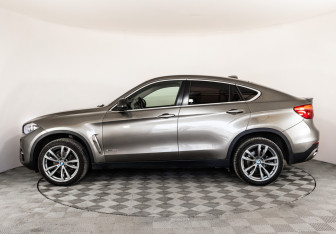Подержанный автомобиль BMW X6 2017 года (9 фото)