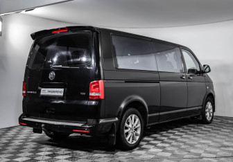 Подержанный автомобиль Volkswagen Caravelle 2013 года (5 фото)