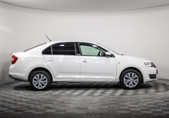 Подержанный автомобиль Skoda Rapid Liftback 2014 года (4 фото)