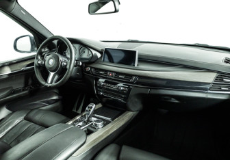 Подержанный автомобиль BMW X5 2015 года (9 фото)