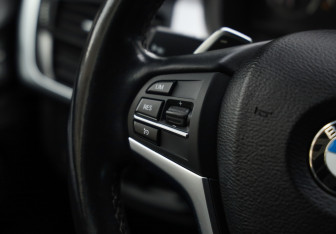 Подержанный автомобиль BMW X6 2015 года (13 фото)