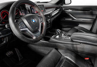 Подержанный автомобиль BMW X6 2015 года (9 фото)