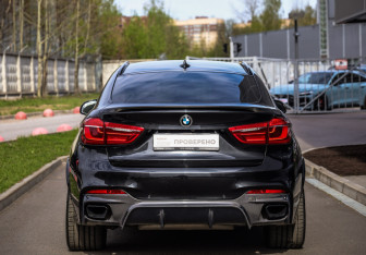 Подержанный автомобиль BMW X6 2017 года (7 фото)