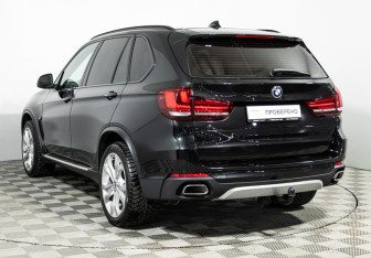 Подержанный автомобиль BMW X5 2015 года (7 фото)