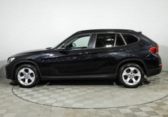 Подержанный автомобиль BMW X1 2014 года (8 фото)