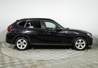 Подержанный автомобиль BMW X1 2014 года (4 фото)