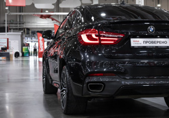Подержанный автомобиль BMW X6 2018 года (10 фото)