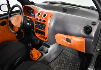 Подержанный автомобиль Daewoo Matiz 2012 года (12 фото)