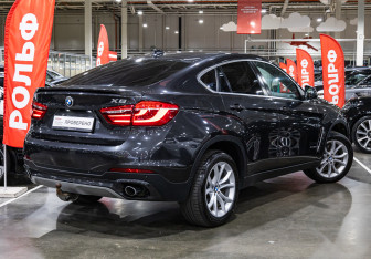 Подержанный автомобиль BMW X6 2016 года (7 фото)