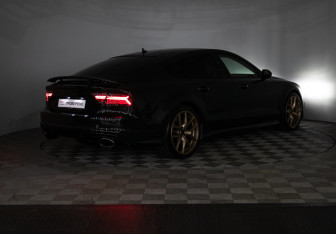 Подержанный автомобиль Audi A7 2015 года (32 фото)